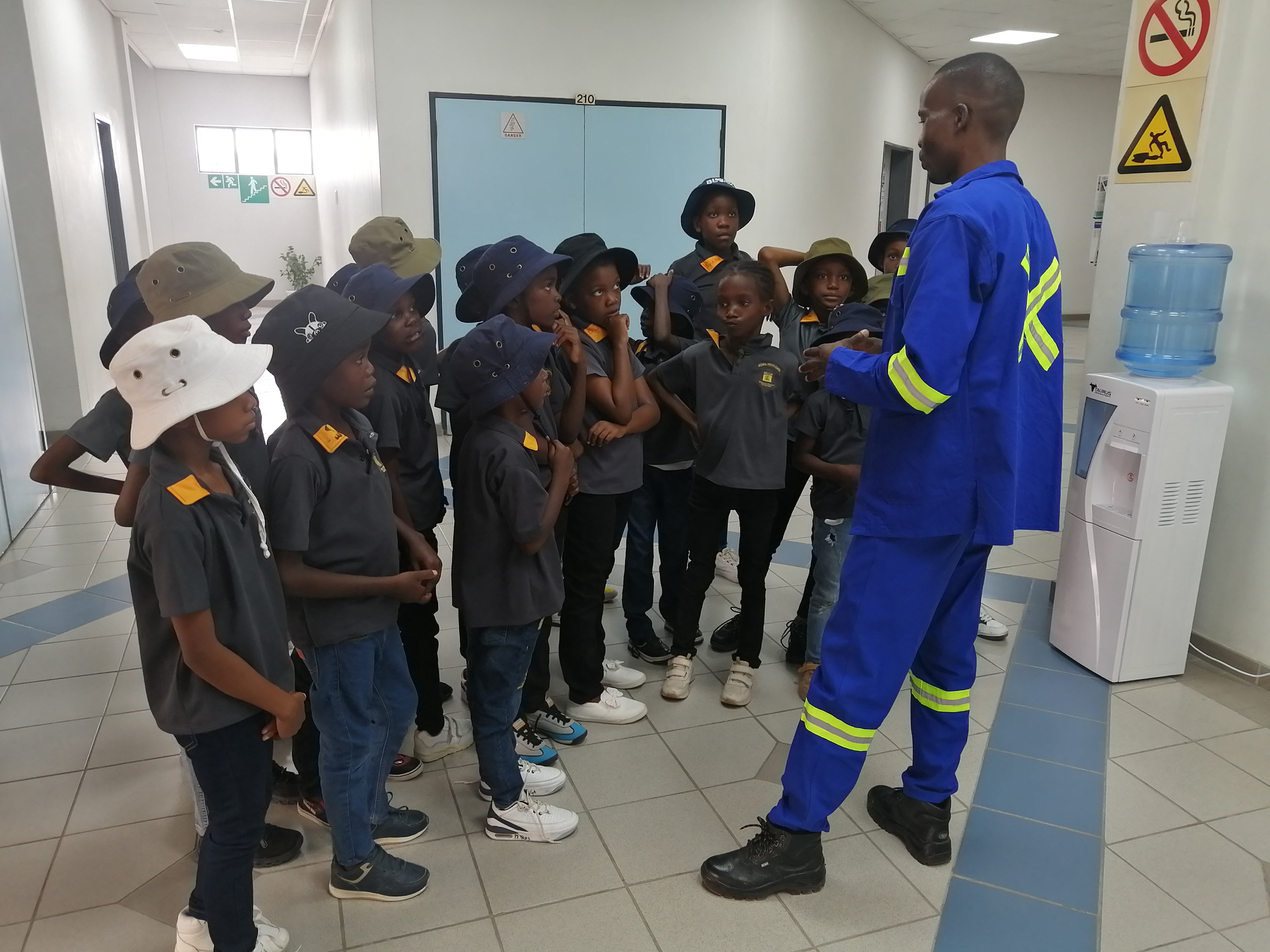 NAM Water staff explaining processes to students